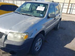 2006 Ford Escape XLS with VIN 1FMYU92Z66KB78298, listed as a IAAI auction lot 41867231 with 204,809 mi miles. Bid and sale history available at carsss.com. Image 6.