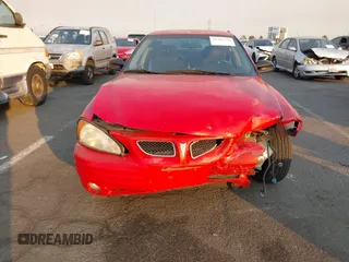 2001 Pontiac Grand Am SE1 with VIN 1G2NF52T91M570800, listed as a IAAI auction lot 41307660 with 180,401 mi miles. Bid and sale history available at carsss.com. Image 11.