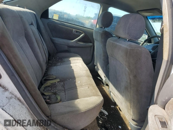 1999 Toyota Camry LE z VIN 4T1BG22K7XU440181, wystawiony jako Copart lot #59304385 z przebiegiem 113 864 mil mil oraz Czysty tytuł • Clean title. Historia ofert i sprzedaży dostępna na DreamBid. Obrazek 10.