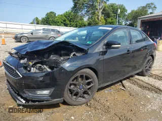 2016 Ford Focus SE with VIN 1FADP3F21GL228871, listed as a Copart auction lot 63506525 with 62,756 mi miles and Salvage title. Bid and sale history available at DreamBid. Image 1.