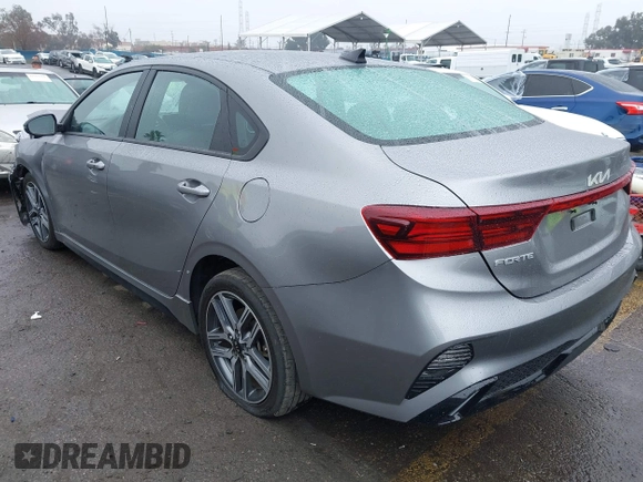2023 Kia Forte GT-Line z VIN 3KPF54AD8PE602683, wystawiony jako IAAI lot #41444418 z przebiegiem 52 229 mil mil oraz . Historia ofert i sprzedaży dostępna na DreamBid. Obrazek 3.