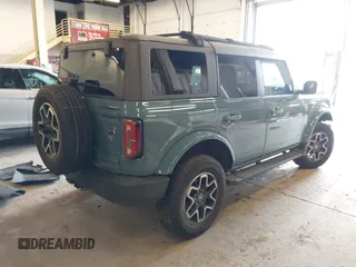 2022 Ford Bronco with VIN 1FMEE5BP2NLB64026, listed as a IAAI auction lot 41796641 with 30,779 mi miles. Bid and sale history available at carsss.com. Image 4.