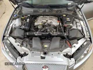 2015 Jaguar XF Portfolio with VIN SAJWJ0FF8F8U65883, listed as a Copart auction lot 55783945 with 133,431 mi miles and Salvage Title. Bid and sale history available at DreamBid. Image 11.