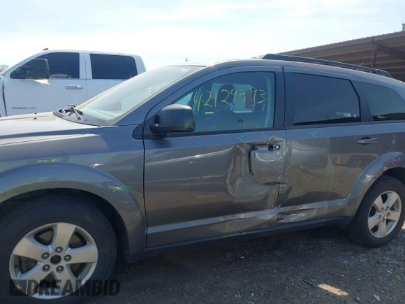 2013 Dodge Journey American Value with VIN 3C4PDCAB5DT509059, listed as a IAAI auction lot 42124093 with 162,904 mi miles and . Bid and sale history available at DreamBid. Image 14.