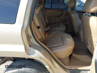 1999 Jeep Grand Cherokee Limited with VIN 1J4GW68N5XC687298, listed as a IAAI auction lot 42222106 with 126,067 mi miles and . Bid and sale history available at DreamBid. Image 8.
