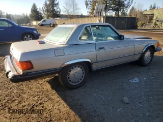 1987 Mercedes-Benz 560 SL with VIN WDBBA48D6HA057618, listed as a Copart auction lot 43252525 with 86,855 mi miles and Salvage Title. Bid and sale history available at DreamBid. Image 3.