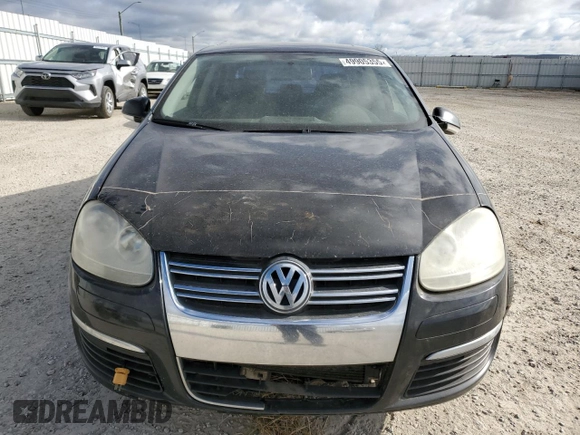 2006 Volkswagen Jetta 1.9L TDI z VIN 3VWST71K46M621589, wystawiony jako Copart lot #49905355 z przebiegiem 335 621 mil mil oraz Szkoda całkowita • Salvage title. Historia ofert i sprzedaży dostępna na DreamBid. Obrazek 5.