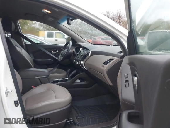 2013 Hyundai Tucson GLS with VIN KM8JU3AC4DU675511, listed as a IAAI auction lot 40765852 with 147,061 mi miles. Bid and sale history available at carsss.com. Image 5.