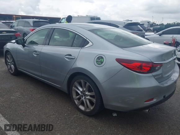2016 Mazda 6 i Touring with VIN JM1GJ1V57G1434250, listed as a IAAI auction lot 42241857 with 68,011 mi miles and . Bid and sale history available at DreamBid. Image 3.