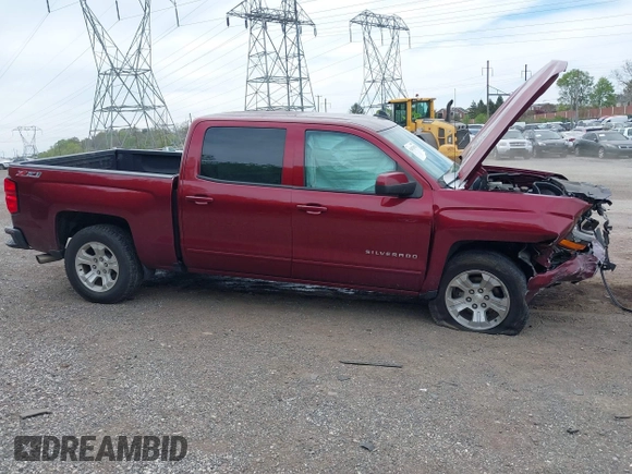 2017 Chevrolet Silverado 1500 LT with VIN 3GCUKREC5HG319937, listed as a IAAI auction lot 42073970 with 99,219 mi miles and . Bid and sale history available at DreamBid. Image 14.