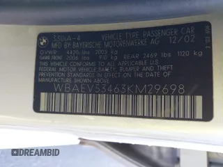 2003 BMW 3 Series 330i with VIN WBAEV53463KM29698, listed as a IAAI auction lot 41528947 with 204,400 mi miles. Bid and sale history available at carsss.com. Image 9.