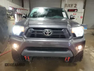 2014 Toyota Tacoma with VIN 5TFLU4ENXEX089927, listed as a Copart auction lot 52140565 with 112,924 mi miles and Salvage Title. Bid and sale history available at DreamBid. Image 5.