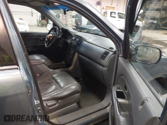 2005 Honda Pilot EX-L with RES with VIN 2HKYF18615H515907, listed as a IAAI auction lot 41520756 with 172,939 mi miles. Bid and sale history available at carsss.com. Image 5.