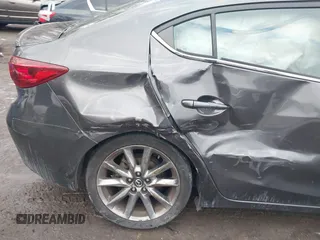2018 Mazda 3 Touring with VIN 3MZBN1V35JM174323, listed as a IAAI auction lot 41412732 with 80,008 mi miles. Bid and sale history available at carsss.com. Image 6.