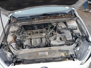 2015 Ford Fusion S with VIN 3FA6P0G70FR219905, listed as a IAAI auction lot 41228828 with 62,030 mi miles and . Bid and sale history available at carsss.com. Image 10.