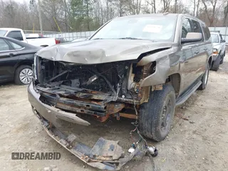 2015 Chevrolet Suburban LT z VIN 1GNSCJKC6FR675585, wystawiony jako IAAI lot #41510570 z przebiegiem 156 818 mil mil oraz . Historia ofert i sprzedaży dostępna na DreamBid. Obrazek 6.