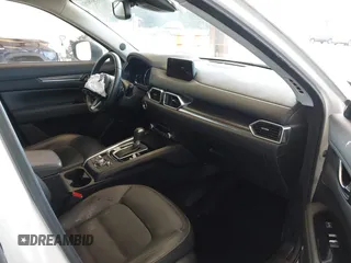 2020 Mazda CX-5 Grand Touring with VIN JM3KFBDM2L0863944, listed as a IAAI auction lot 42150805 with 63,932 mi miles and . Bid and sale history available at DreamBid. Image 5.
