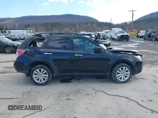 2011 Subaru Forester 2.5X Premium with VIN JF2SHACC0BH718411, listed as a IAAI auction lot 41515167 with 140,884 mi miles. Bid and sale history available at carsss.com. Image 12.