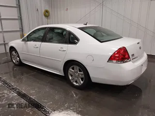 2014 Chevrolet Impala LT with VIN 2G1WB5E30E1140591, listed as a IAAI auction lot 41620447 with 186,226 mi miles and . Bid and sale history available at DreamBid. Image 3.