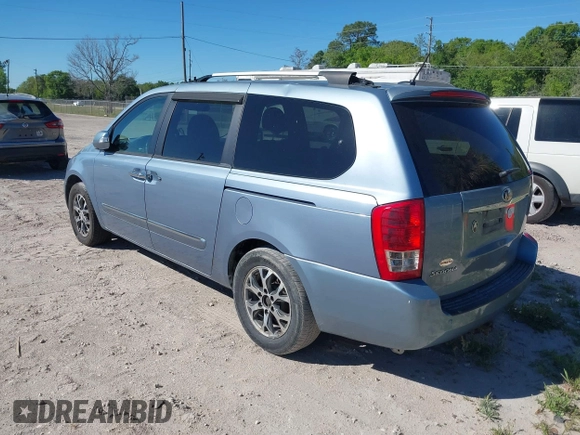 2014 Kia Sedona EX with VIN KNDMH4C70E6553732, listed as a IAAI auction lot 41812283 with 676,894 mi miles. Bid and sale history available at carsss.com. Image 3.