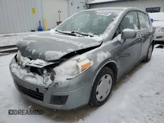 2009 Nissan Versa 1.8 S with VIN 3N1BC13E69L460635, listed as a Copart auction lot 84597484 with 171,263 mi miles and Salvage Title. Bid and sale history available at carsss.com. Image 1.
