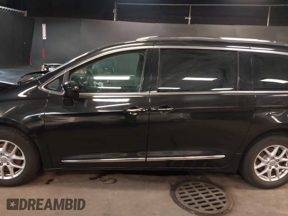 2020 Chrysler Pacifica Touring L with VIN 2C4RC1BG2LR280156, listed as a IAAI auction lot 42182406 with 105,038 mi miles and . Bid and sale history available at DreamBid. Image 14.