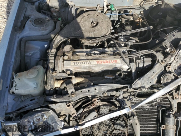 1988 Toyota Corolla with VIN JT2AE92E9J3140852, listed as a Copart auction lot 74968874 with 169,427 mi miles and Salvage title. Bid and sale history available at DreamBid. Image 11.