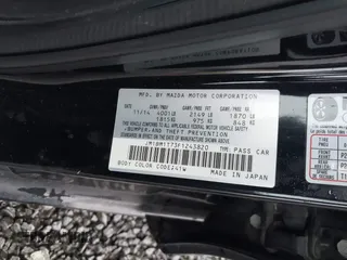 2015 Mazda 3 i SV with VIN JM1BM1T73F1243820, listed as a IAAI auction lot 41167112 with 126,063 mi miles. Bid and sale history available at carsss.com. Image 9.
