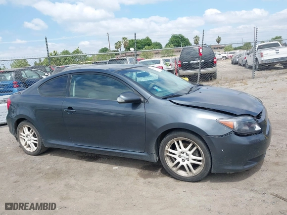 2006 Scion tC with VIN JTKDE177260081483, listed as a IAAI auction lot 42076072 with 156,556 mi miles. Bid and sale history available at carsss.com. Image 14.