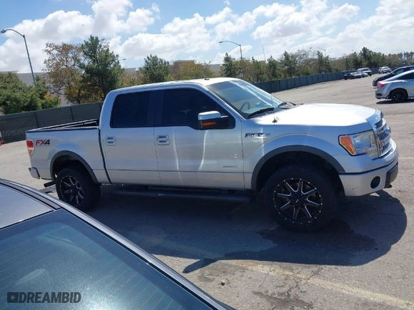 2013 Ford F-150 XL with VIN 1FTFW1ETXDFB30887, listed as a IAAI auction lot 41809584 with 191,496 mi miles. Bid and sale history available at carsss.com. Image 13.