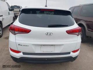 2016 Hyundai Tucson SE with VIN KM8J23A4XGU238521, listed as a IAAI auction lot 41886259 with 126,974 mi miles. Bid and sale history available at carsss.com. Image 16.