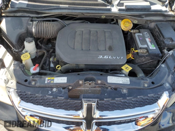 2013 Dodge Grand Caravan SE with VIN 2C4RDGBG8DR741359, listed as a Copart auction lot 52810065 with 103,735 mi miles and Salvage Title. Bid and sale history available at DreamBid. Image 12.