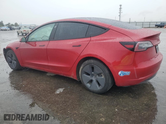 2021 Tesla Model 3 Standard Range Plus with VIN 5YJ3E1EA9MF870214, listed as a Copart auction lot 47702535 with 46,486 mi miles and Salvage Title. Bid and sale history available at DreamBid. Image 2.