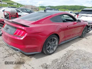 2020 Ford Mustang EcoBoost z VIN 1FA6P8TH6L5149788, wystawiony jako IAAI lot #42179624 z przebiegiem 107 520 mil mil oraz . Historia ofert i sprzedaży dostępna na DreamBid. Obrazek 4.