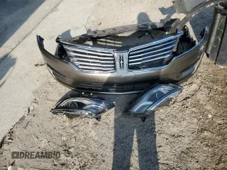 2017 Lincoln MKC Premiere z VIN 5LMCJ1C95HUL16078, wystawiony jako Copart lot #55853005 z przebiegiem 114 821 mil mil oraz Szkoda całkowita • Salvage title. Historia ofert i sprzedaży dostępna na DreamBid. Obrazek 13.