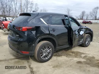 2017 Mazda CX-5 Touring with VIN JM3KFACLXH0195725, listed as a Copart auction lot 47464365 with 65,457 mi miles and Salvage Title. Bid and sale history available at carsss.com. Image 3.