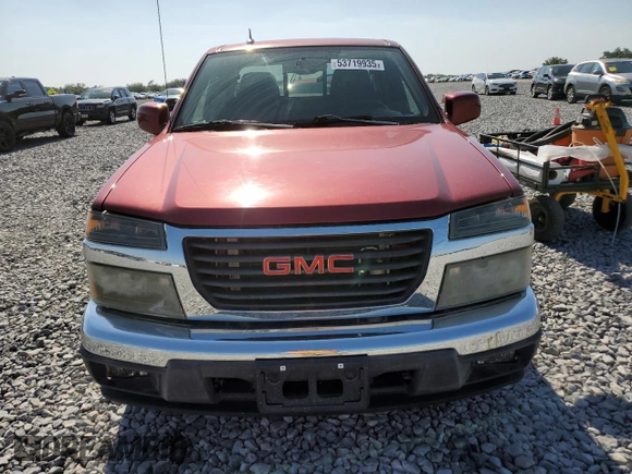 2011 GMC Canyon z VIN 1GTE5NF93B8100138, wystawiony jako Copart lot #53719935 z przebiegiem 94 730 mil mil oraz Czysty tytuł • Clean title. Historia ofert i sprzedaży dostępna na DreamBid. Obrazek 5.