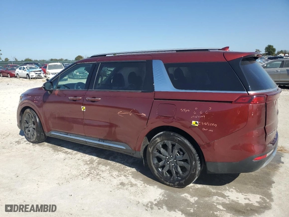 2022 Kia Carnival SX with VIN KNDNE5H32N6067285, listed as a Copart auction lot 75514734 with 103,473 mi miles and Salvage Title. Bid and sale history available at carsss.com. Image 2.