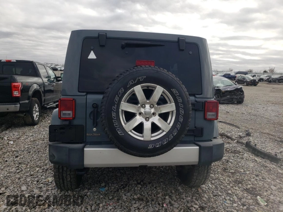 2015 Jeep Wrangler Unlimited Sahara with VIN 1C4BJWEG6FL640316, listed as a Copart auction lot 48024865 with 128,317 mi miles and Salvage Title. Bid and sale history available at carsss.com. Image 6.