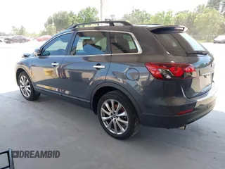 2014 Mazda CX-9 Grand Touring z VIN JM3TB2DA0E0434181, wystawiony jako IAAI lot #42295436 z przebiegiem 78 372 mil mil oraz . Historia ofert i sprzedaży dostępna na DreamBid. Obrazek 3.