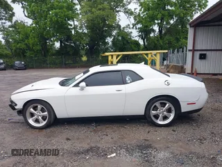 2015 Dodge Challenger SXT with VIN 2C3CDZAG2FH701634, listed as a IAAI auction lot 42242521 with 153,379 mi miles and . Bid and sale history available at DreamBid. Image 15.