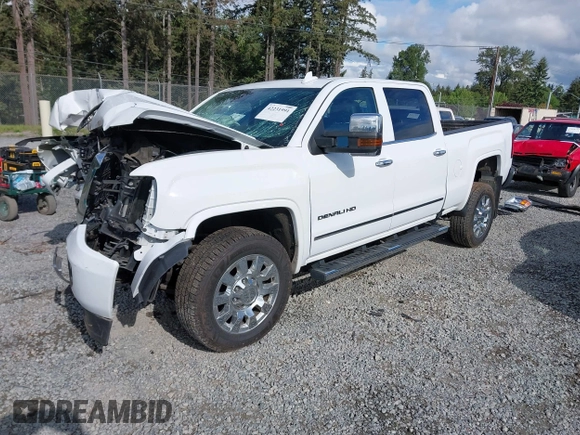 2019 GMC Sierra 2500HD Denali z VIN 1GT12SEY3KF269442, wystawiony jako IAAI lot #42231991 z przebiegiem 75 172 mil mil oraz . Historia ofert i sprzedaży dostępna na DreamBid. Obrazek 18.