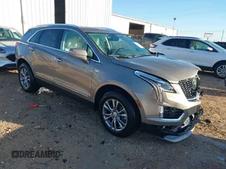 2023 Cadillac XT5 FWD Premium Luxury z VIN 1GYKNCRS4PZ128189, wystawiony jako IAAI lot #41445273 z przebiegiem 7 186 mil mil oraz . Historia ofert i sprzedaży dostępna na DreamBid. Obrazek 1.