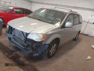 2012 Dodge Grand Caravan SXT with VIN 2C4RDGCG8CR139087, listed as a IAAI auction lot 41090171 with 202,461 mi miles and . Bid and sale history available at DreamBid. Image 2.