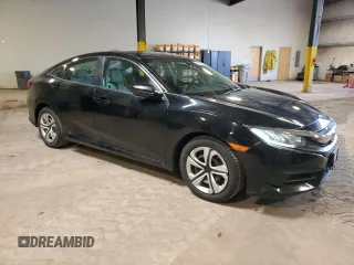 2018 Honda Civic LX with VIN 19XFC2F5XJE204085, listed as a Copart auction lot 51323935 with 164,201 mi miles and Salvage Title. Bid and sale history available at carsss.com. Image 4.