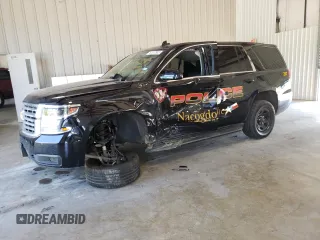 2020 Chevrolet Tahoe Commercial z VIN 1GNLCDEC1LR297818, wystawiony jako Copart lot #74242524 z przebiegiem 35 716 mil mil oraz Szkoda całkowita • Salvage title. Historia ofert i sprzedaży dostępna na DreamBid. Obrazek 1.