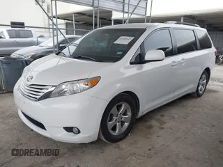2016 Toyota Sienna LE AAS with VIN 5TDKK3DC3GS706606, listed as a IAAI auction lot 41640543 with 201,316 mi miles. Bid and sale history available at carsss.com. Image 17.