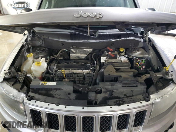 2016 Jeep Compass Sport SE z VIN 1C4NJCBA1GD634172, wystawiony jako Copart lot #80818654 z przebiegiem 185 674 mil mil oraz Szkoda całkowita • Salvage title. Historia ofert i sprzedaży dostępna na DreamBid. Obrazek 12.