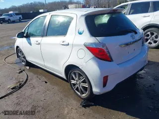 2014 Toyota Yaris L with VIN JTDKTUD31ED590687, listed as a IAAI auction lot 41190914 with 95,330 mi miles. Bid and sale history available at carsss.com. Image 3.