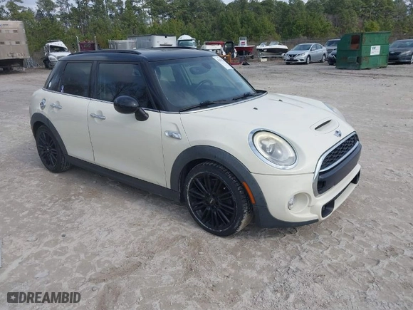 2017 MINI Hardtop 4 Door Cooper S with VIN WMWXU3C54H2D32602, listed as a IAAI auction lot 41458333 with 124235 miles. Bid and sale history available at carsss.com. Image 1.